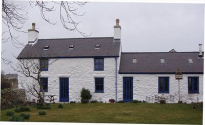 The externally lime washed farmhouse